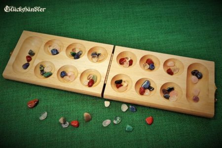 Kalaha-Mancala open with gemstone game pieces 1