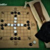 Tablut-Stoff-mit-Verzierungen-und-Spielsteinen-aus-Glas
